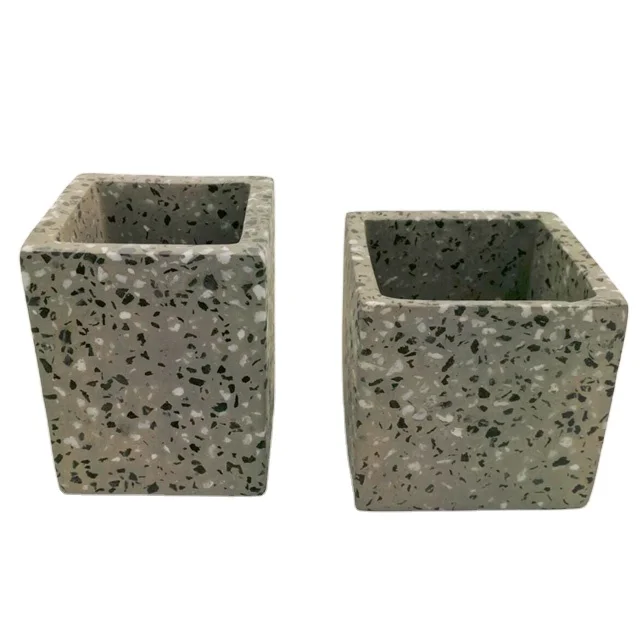 Square concrete candle vessels with marble style surface