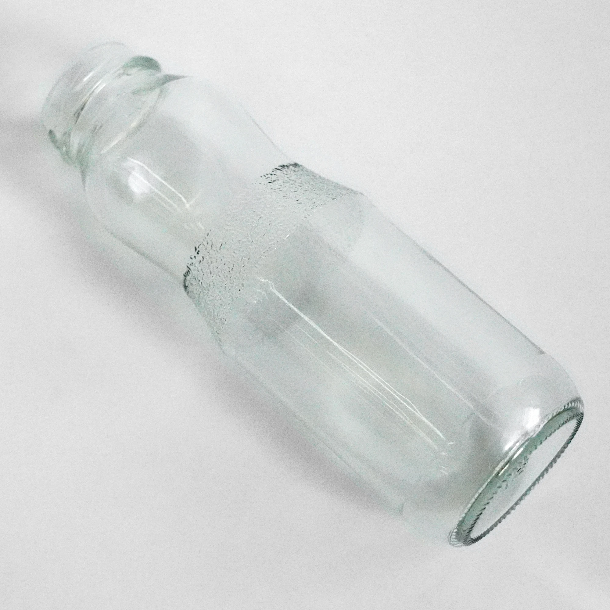 Wholesale 300ml Round Glass beverage drink bottle for juice