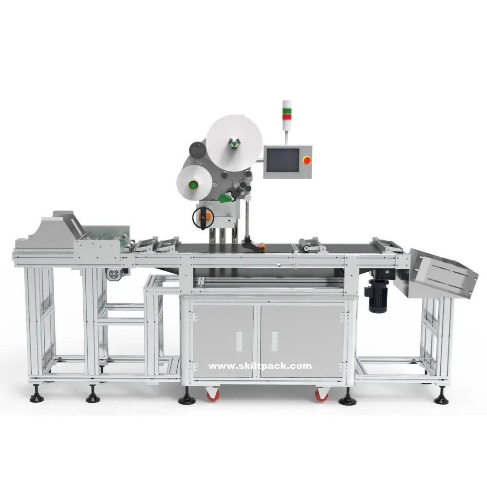 Automatic feeding label applicator for empty bags