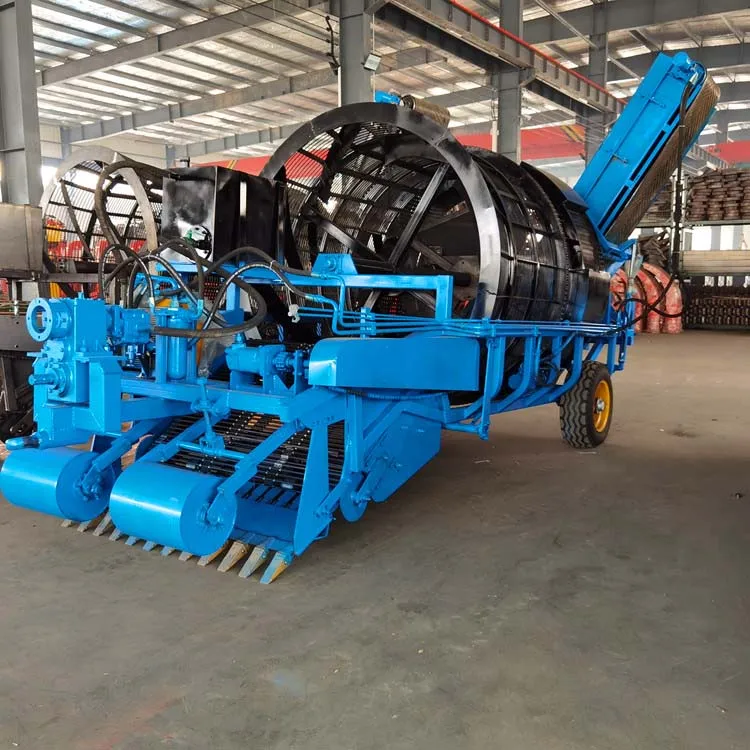 Large stone picker machine collect and recycle debris and clear land and open up wasteland