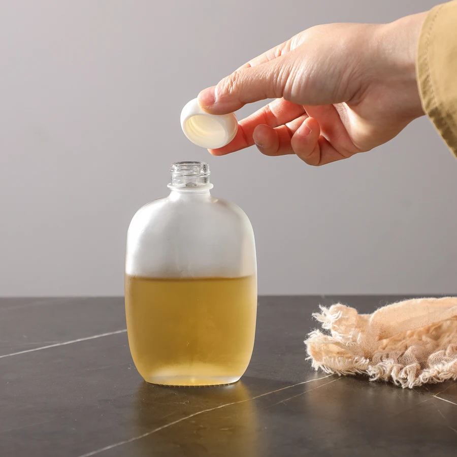 100 ml 200 ml Customized frosted empty cold brew coffee juice whisky glass bottles mini vodka glass bottles with screw cap