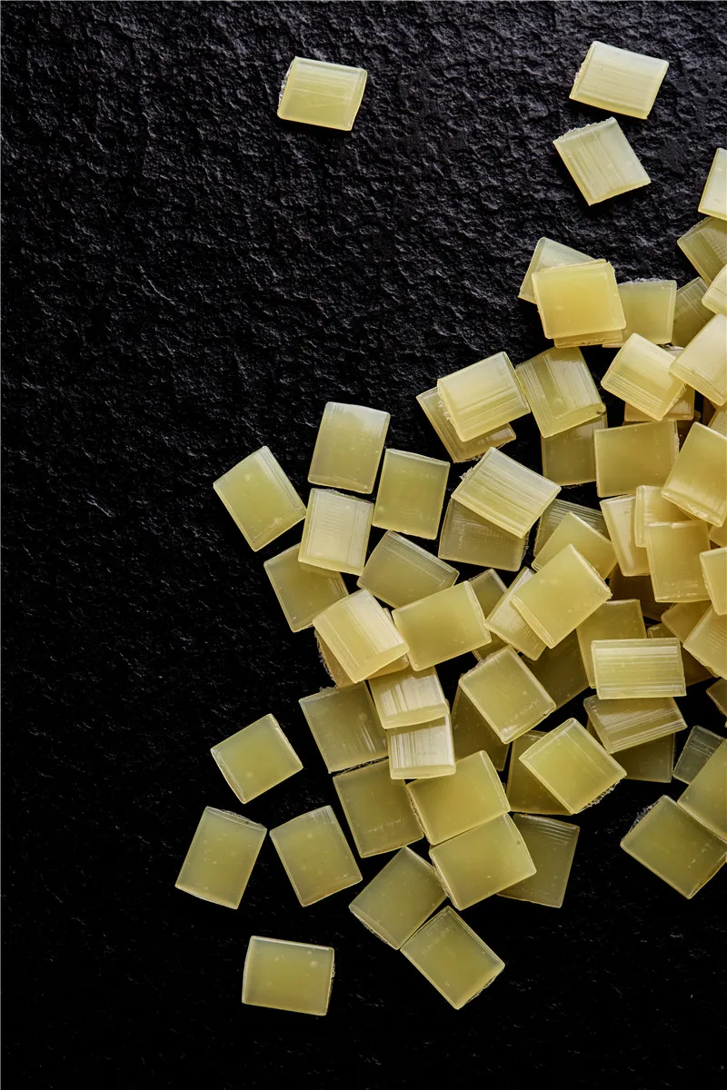 
5002 Fast Curing Adhesive Paper Box Hot Melt Adhesive Particles Yellow Flake 