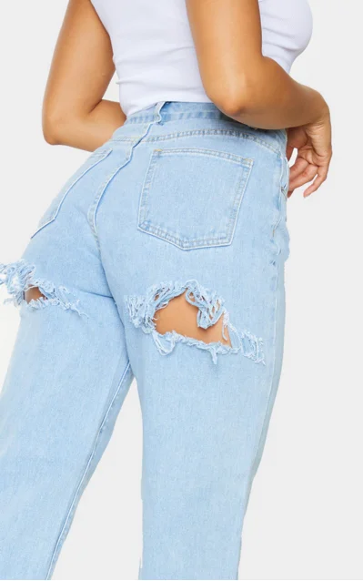 Manufacture custom design light blue wash rips denim pants jeans women