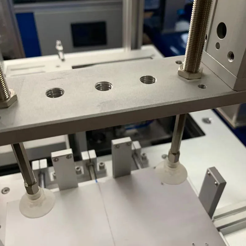 TM 4002  Automatic Feeding Tagging Machine For Towels Floor Mats Car Mats  Labeling Machines