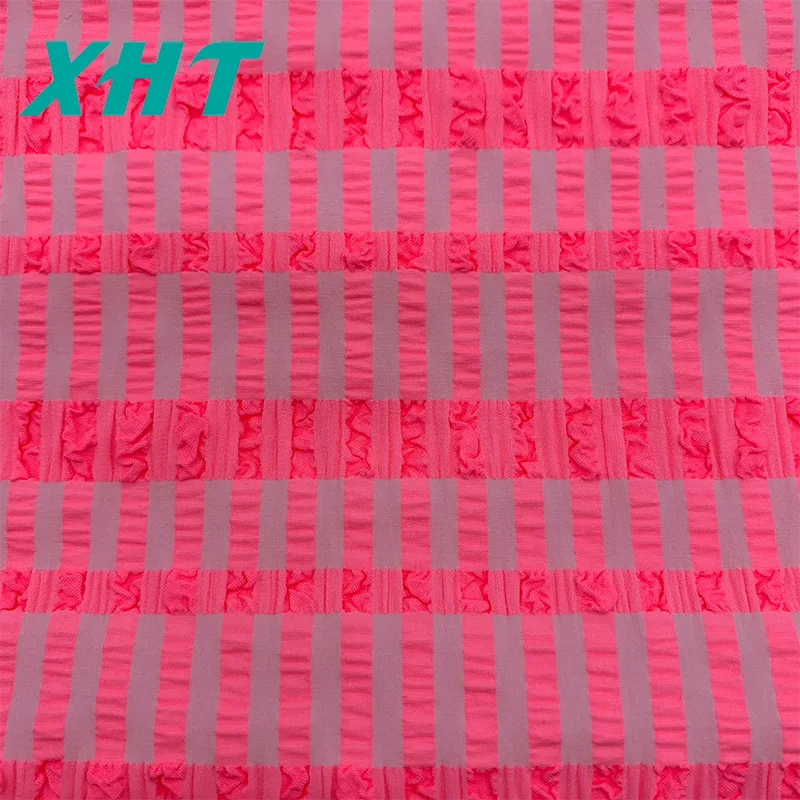 Hot selling customized color 4 way stretch woven Jacquard seersucker swimwear fabric
