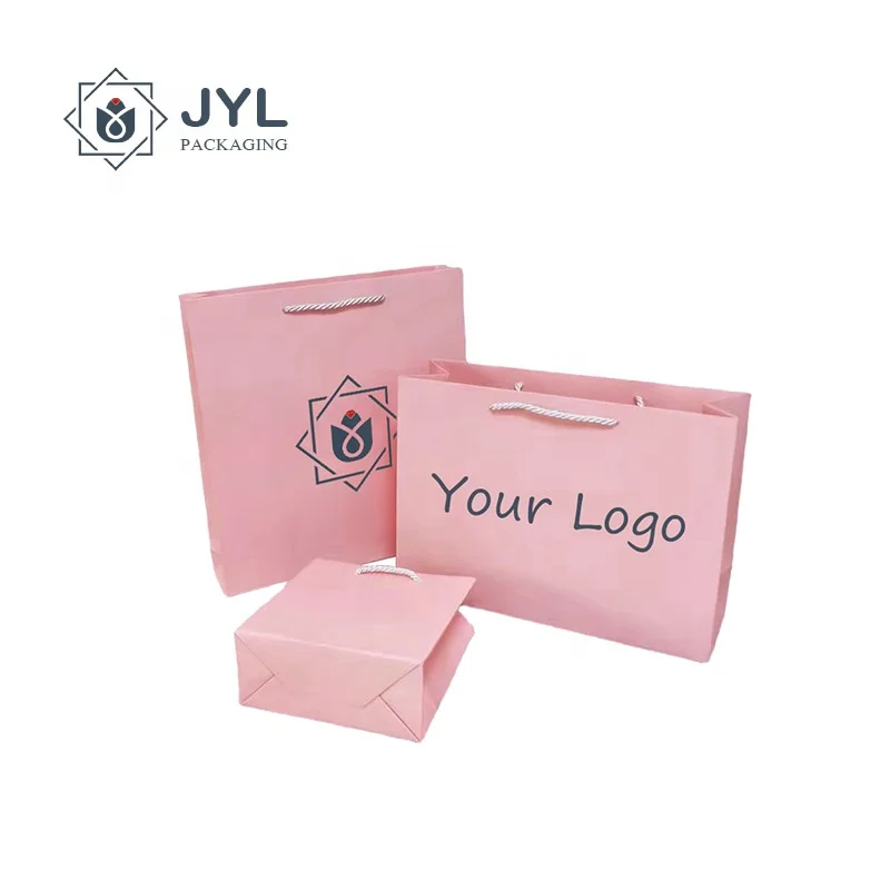 Manufacturer OEM Handmade UV Printing Pink Cardboard Ribbon Handles Customized Logo Cosmetics Paper Bags