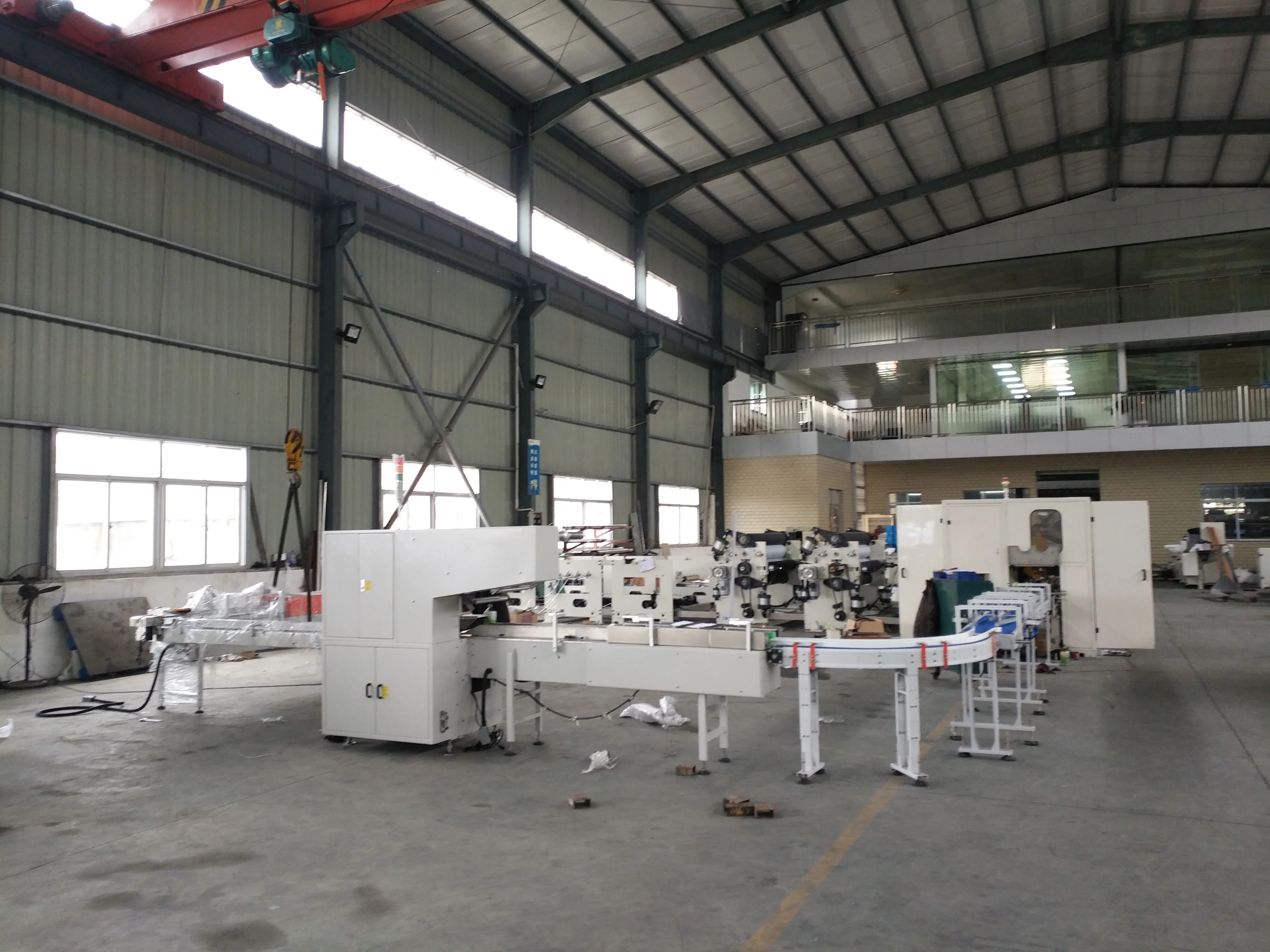 High quality color glue lamination kitchen towel production line color printing double embossing cutting packing machine price