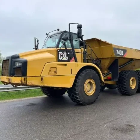 Подержанный cat 740B шарнирный грузовик оригинальная погрузочная техника в США 40-тонный колесный карьерный для продажи