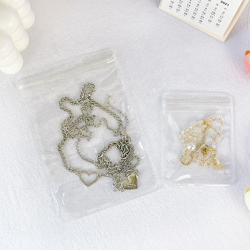 Transparent jewelry storage book pvc jewelry sealed bag anti-oxidation large capacity simple necklace earring collection book pp