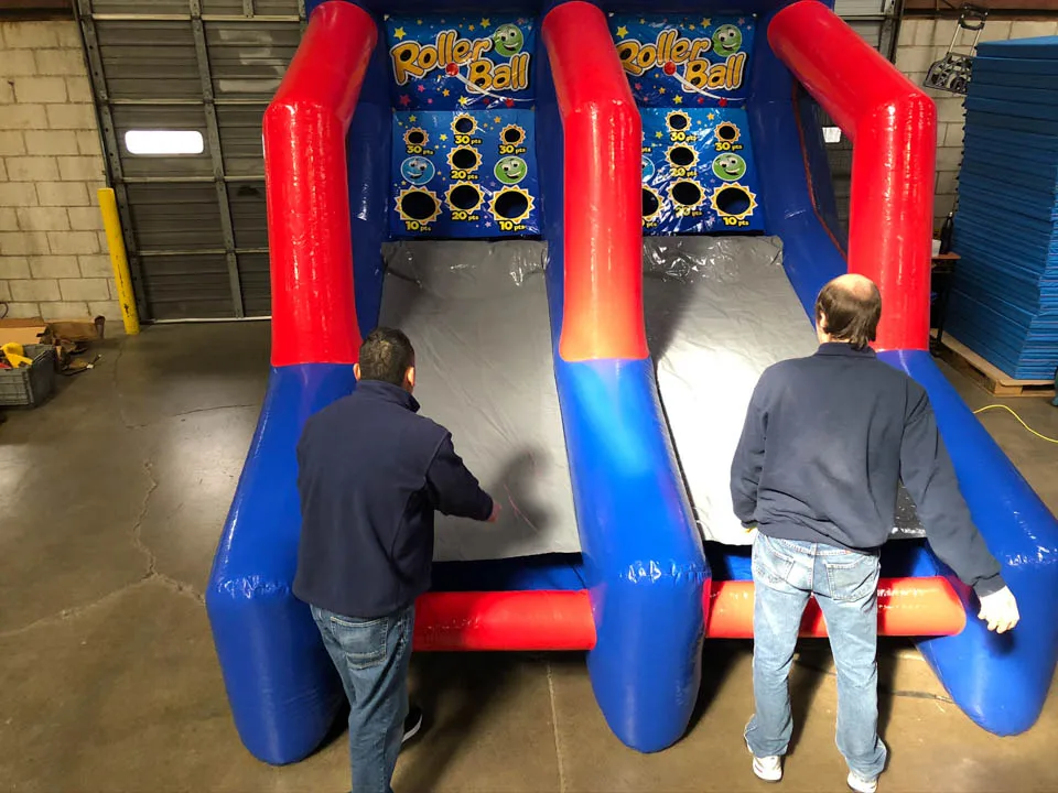 popular carnival game inflatable roller ball shoot game,inflatable shoot game with custom design