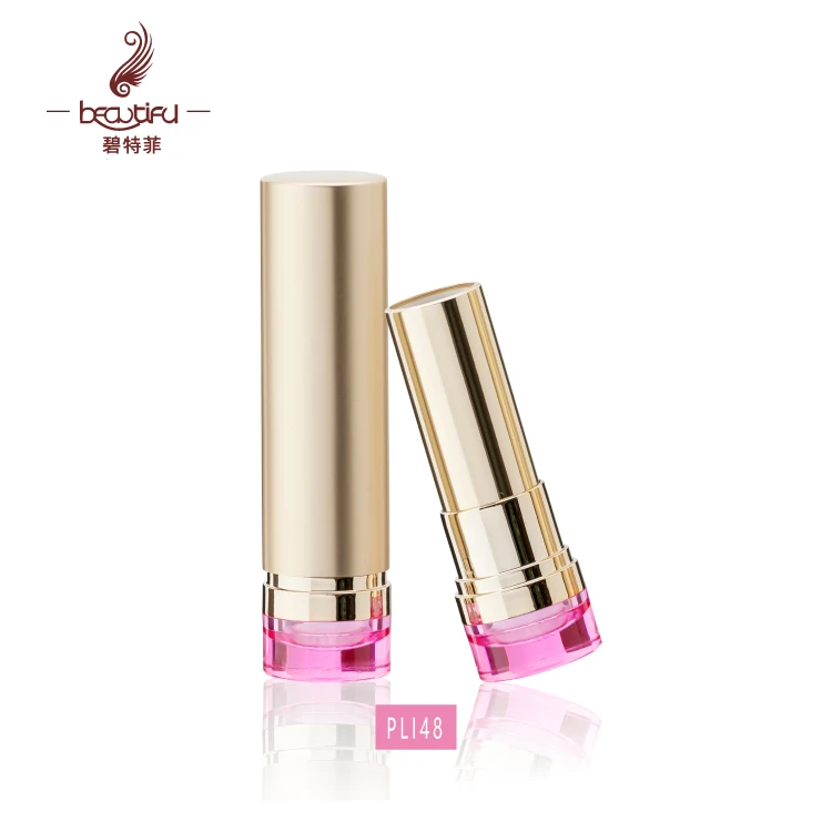 Empty spectaculargold aluminum lipstick case/container/tubes/packaging with a pink base to display color of lipstick