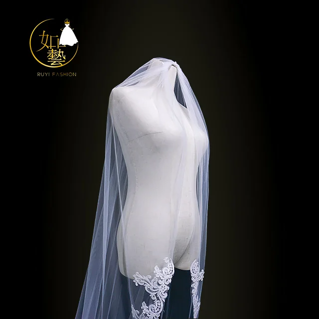 Applique ivory wedding dress shop with long veil