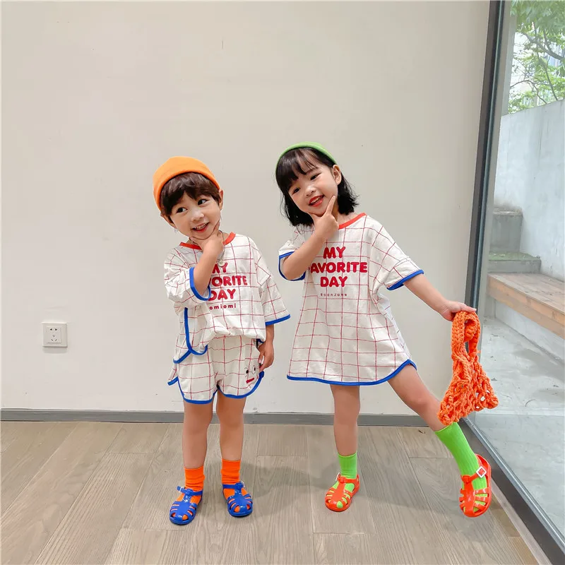 J&H fashion best selling korean baby clothes two piece toddler girls clothing sets loose shirt tops printed fabric & shorts