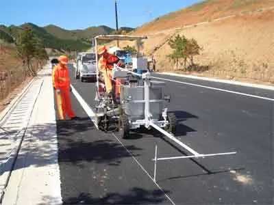 Automatic thermoplastic roadmarking machine