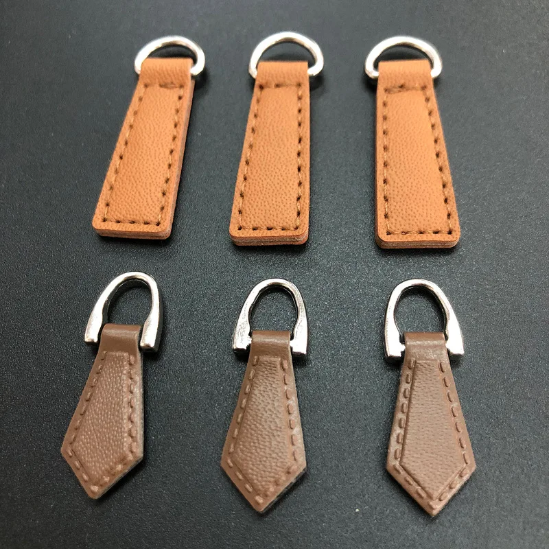 Custom logo PU Leather Zipper Pulls Zipper Tags Fixer Wholesale Garment Accessories Durable Boot Zipper Heads for Bags Jacket