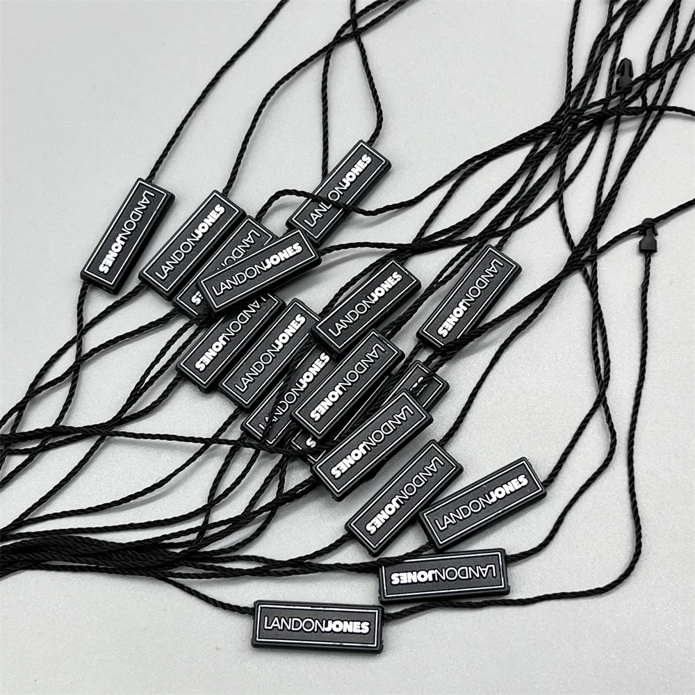 Cheap Customized Embossed Logo  Hangtag Plastic Seal Strings Garment Plastic Rope Seal Hang Tag String Lock For Clothing