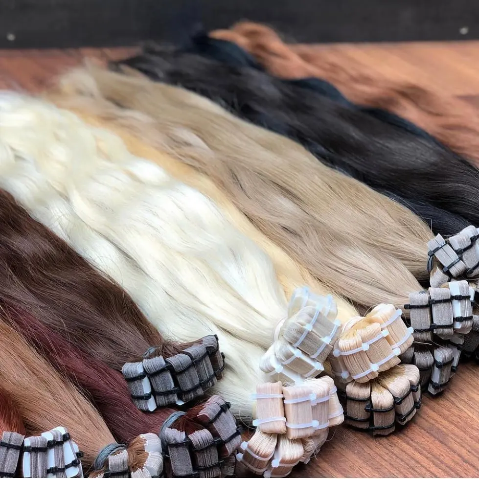 Wholesale factory price double drawn  russian 100human hair tape in hair bundles 12a grade raw tape in hair extensions