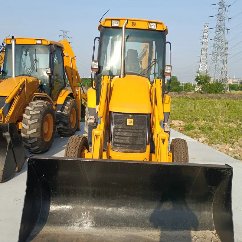 Экскаватор-погрузчик JCB3CX 4 колесные приводные тракторы jcb3cx экскаватор-экскаватор 7 тонн номинальная нагрузка 63 кВт погрузочный экскаватор