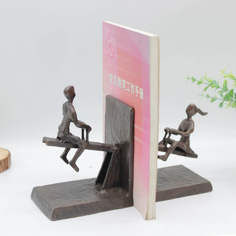 Cast iron sculpture children playing with seesaw bookends figurine For Decor
