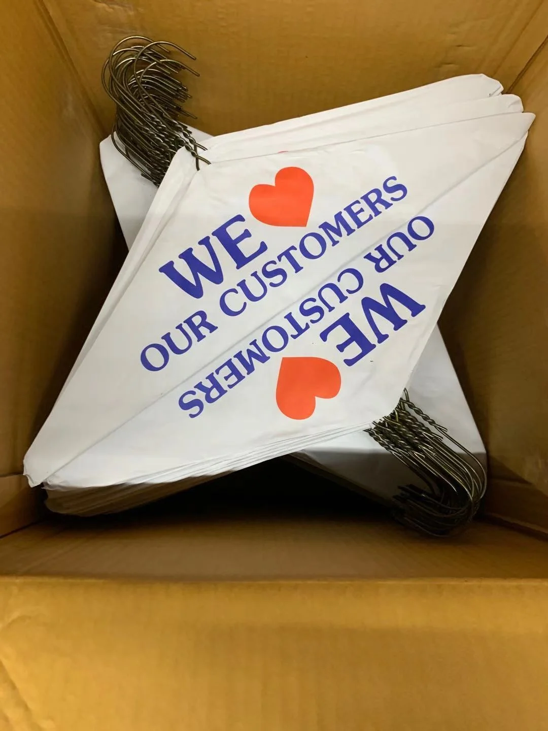 Wire Cape Hangers For Dry Clean We Love Customer Paper Hangers for cloth