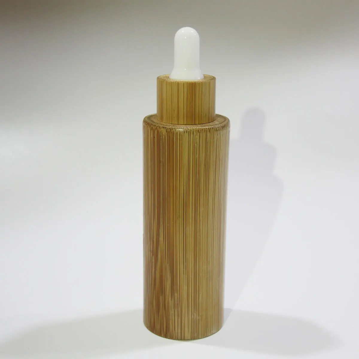 
Wholesale 30ml Cosmetic Round Glass Wood Bottle With Dropper Skin Care Packaging 