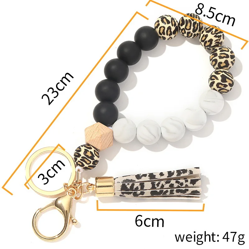 2023 Wholesale New Food Grade Silicone Beads Keychain Bracelet Wooden Bead Key Ring Wristlet With PU Tassel