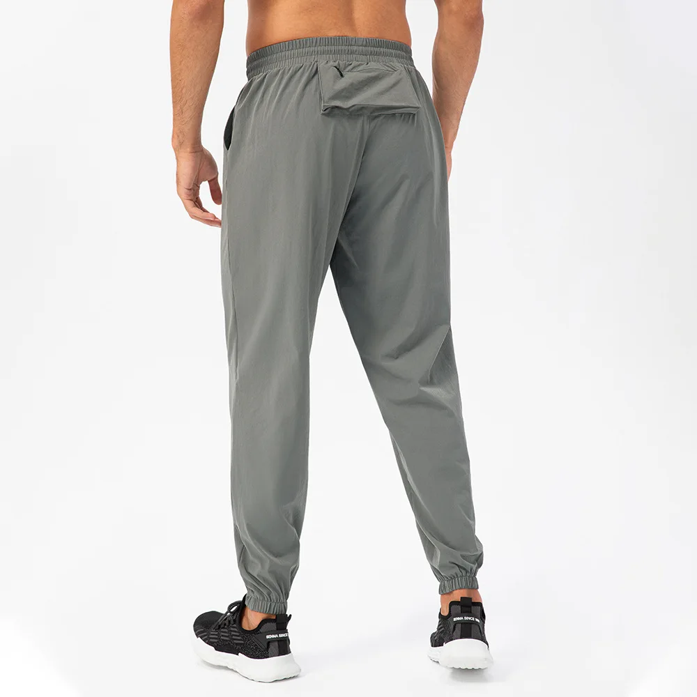 Loose Sports Trousers Casual Stretch Breathable Fitness Pants Running Training Lace-Up Elastic Jogger Pants Men Track Sweatpants