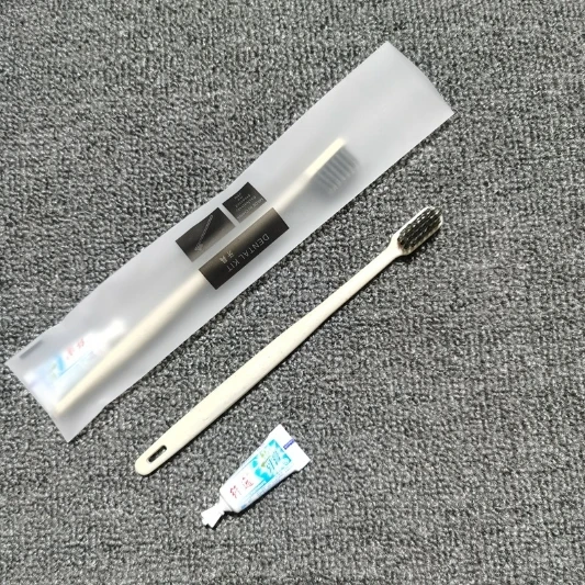 Environmentally friendly adult degradable bamboo charcoal fiber professional OEM/ODM hotel disposable toothbrush with paste