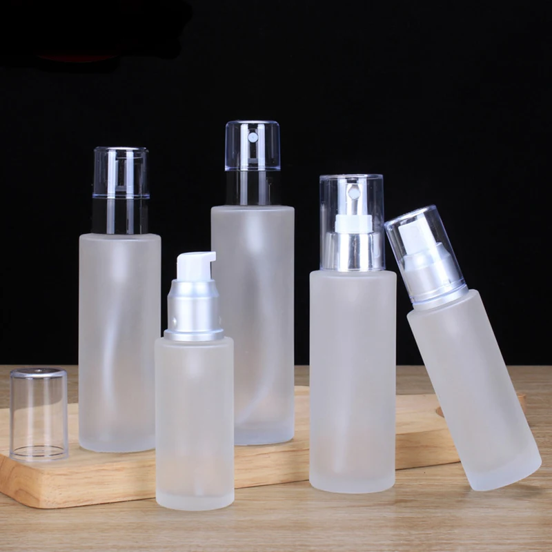 Custom 40ml 50ml 60ml 80ml Frosted Clear Flat Shoulder Cosmetic Spray Liquid Pump Lotion Glass Bottle with Pump Lids