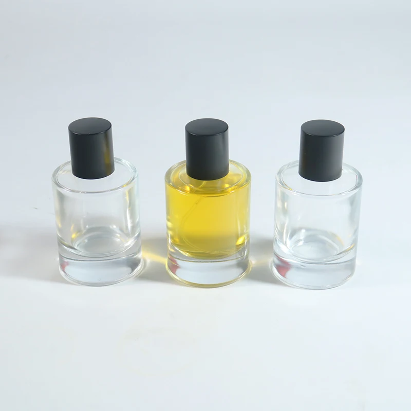Luxury Heavy Base Glass Perfume Bottle 50ml Cylinder Parfum Botol Empty Glass Fragrance Parfum Spray Bottle With Cap