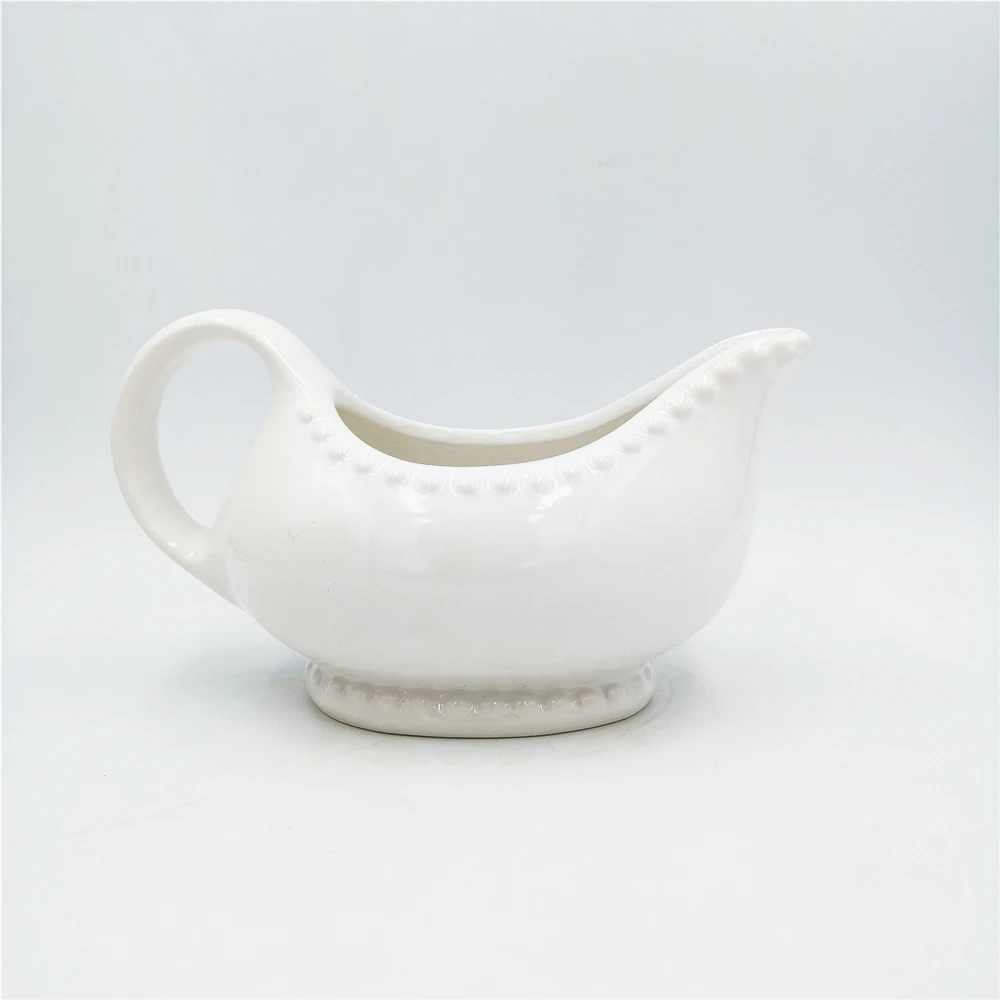 Wholesale cheap embossed dot White Easy-Pour Ceramic sauce Gravy Boat with