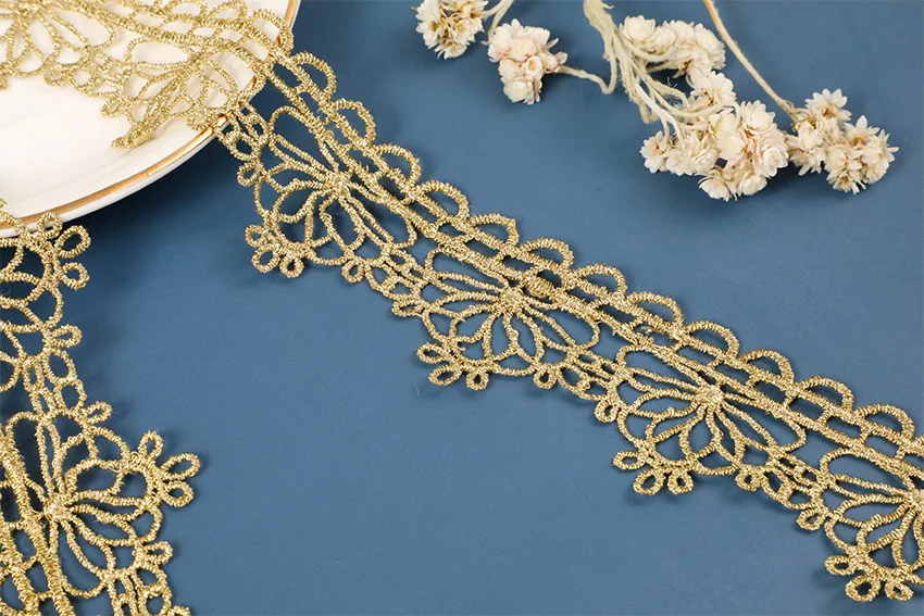 wholesale 35mm polyester golden hollowed out embroidery lace trim fabric for wedding dresses garment