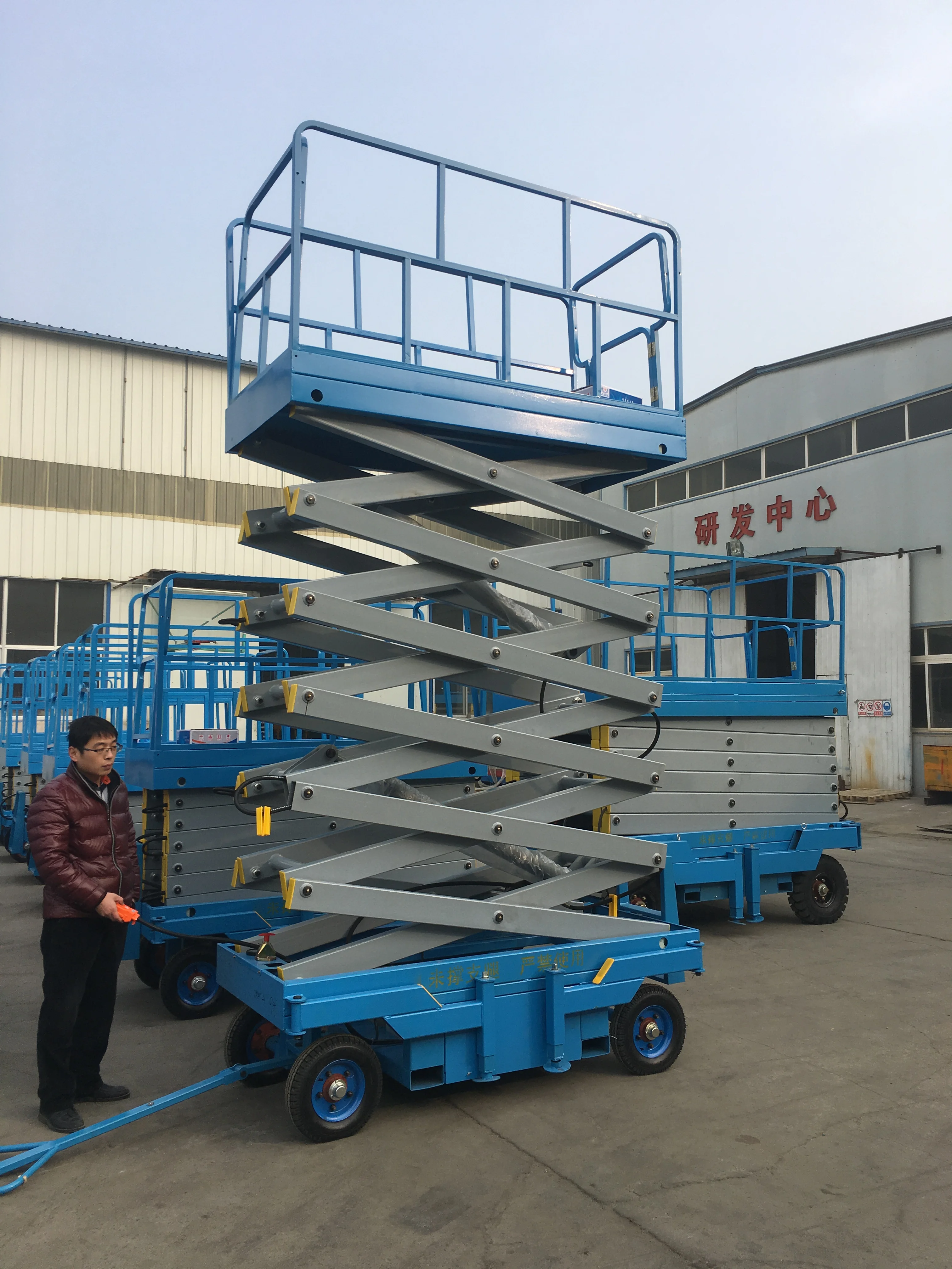 10 м 12 м 14 м 18 м Мобильный Электрический подъемник гидравлический электрический ножничный подъемный аккумулятор Мобильный полуавтоматический ножничный подъемный стол