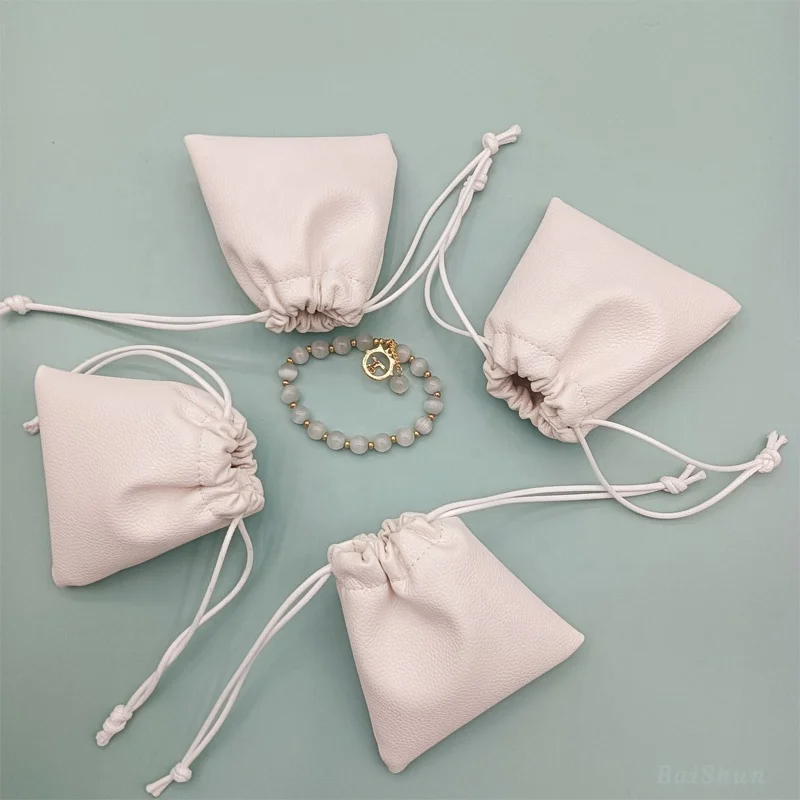 Hot Sale Custom Logo Emboss Pink Pu Leather Drawstring Bag Sunglasses Power Bank Waterproof Leather Pouch