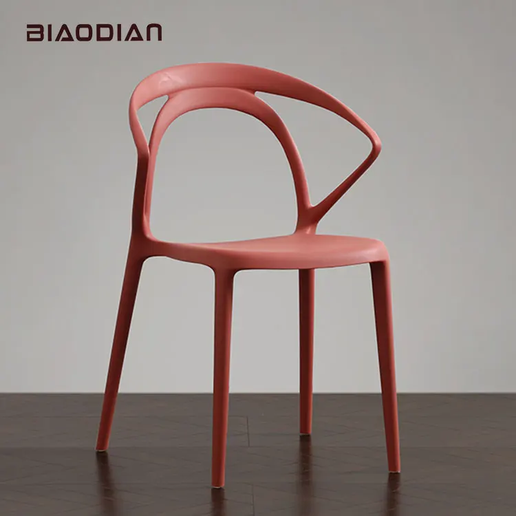 Patented factory modern stacking designer hole back black white pp stackable dining plastic chair for sale