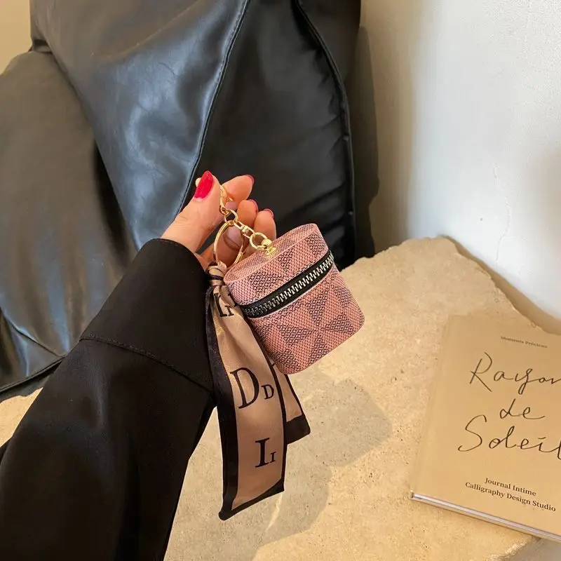 Wholesale Hot sale creative travel leather pendant keychain mini lipstick bag keychain fashion Headphone bag keychain with scarf