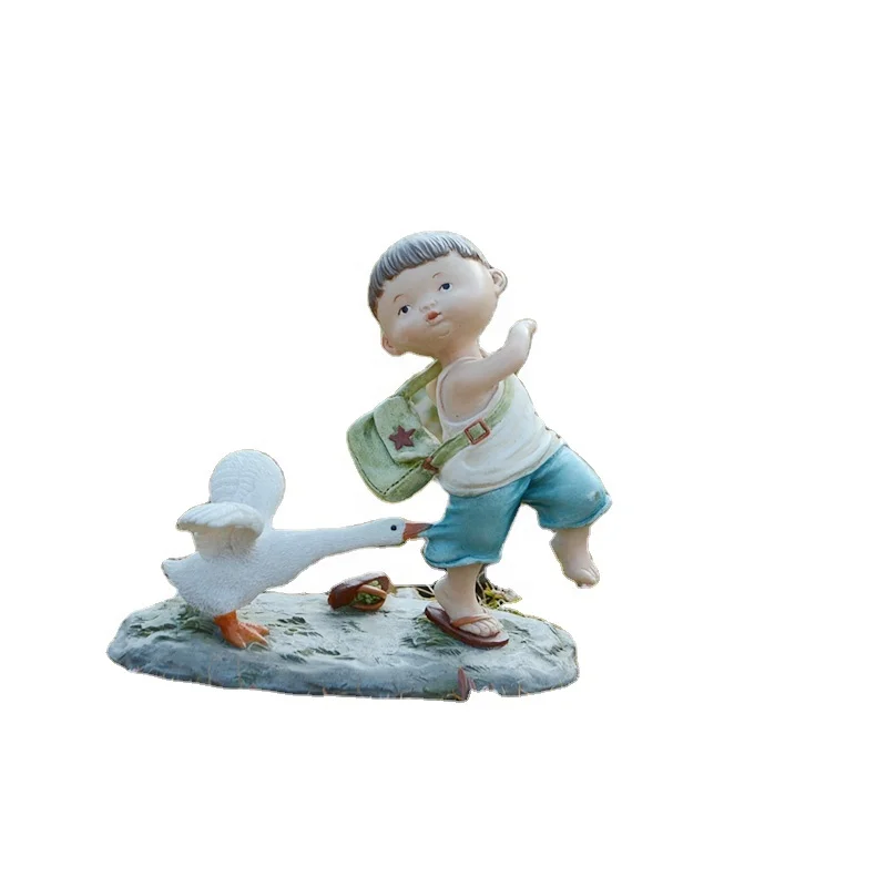 Z16001A Goose chase boy funny product lovely decorative resin handicrafts