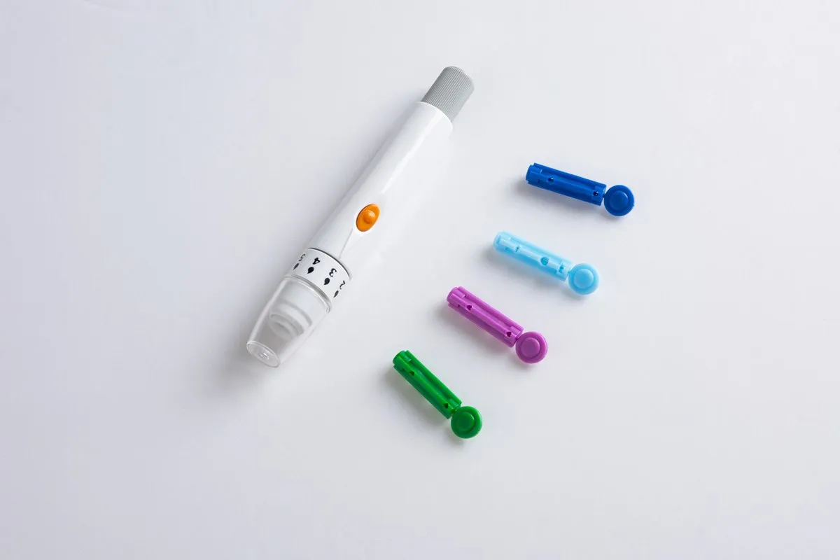 Cheapest price Disposable Sterile Twist type plastic Blood Lancet 21G-30G Stainless Steel Lancets