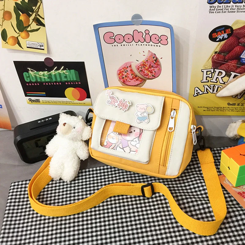 The new 2022 single shoulder slope across soft sister little girl cute nylon canvas bag bag change mobile phone lipstick female