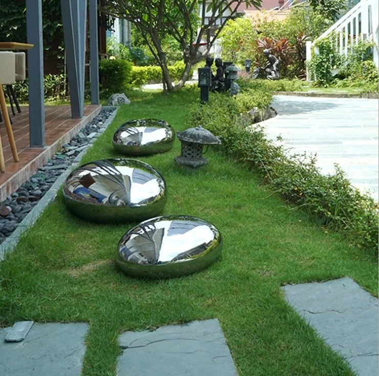 birds hotel lobby stainless steel  oval ball wall cobblestone sculpture swan