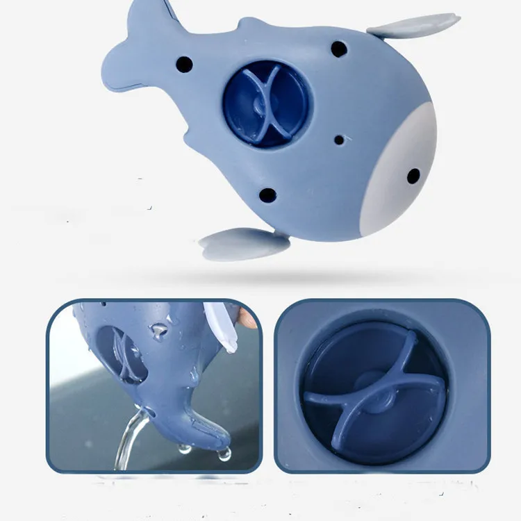 Clockwork swimming baby dolphin children splashing toy plastic