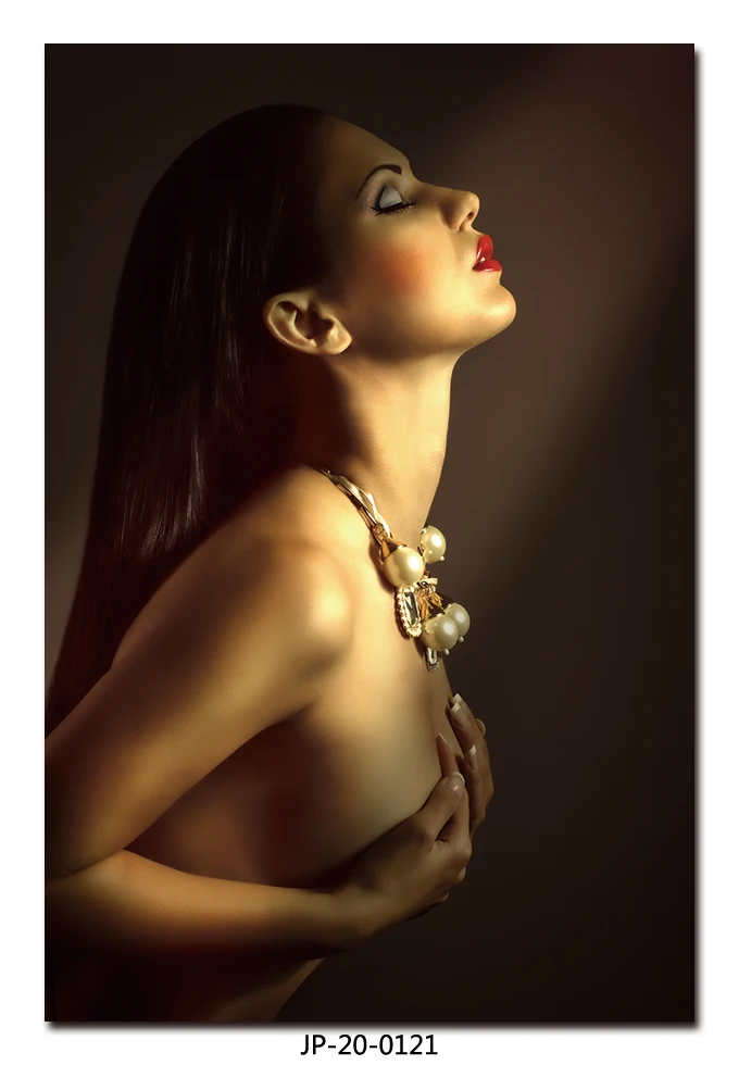 Sexy naked nude girl hangs pictures. for wall paintings