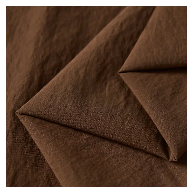 350T Dull Low Elastic Wrinkle Nylon Taffeta Fabric 100% Nylon Ripstop Waterproof Fabric For Down Jacket