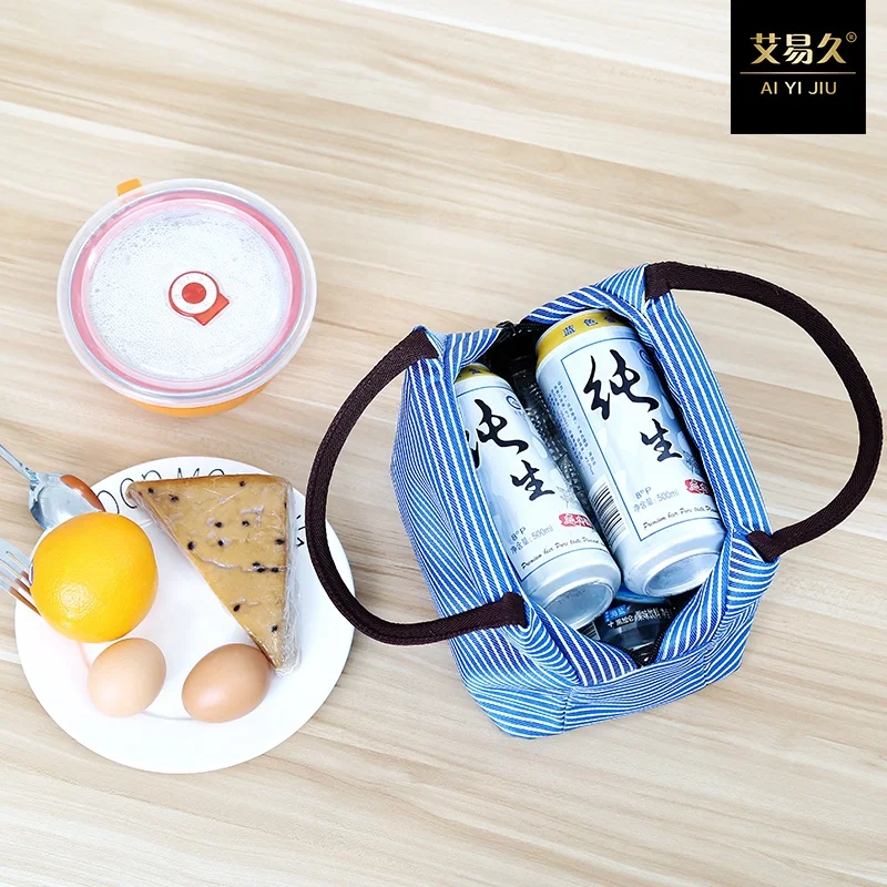 Stripe insulated lunch bag lunch box of male and female children having a picnic lunch box leakage protection bags