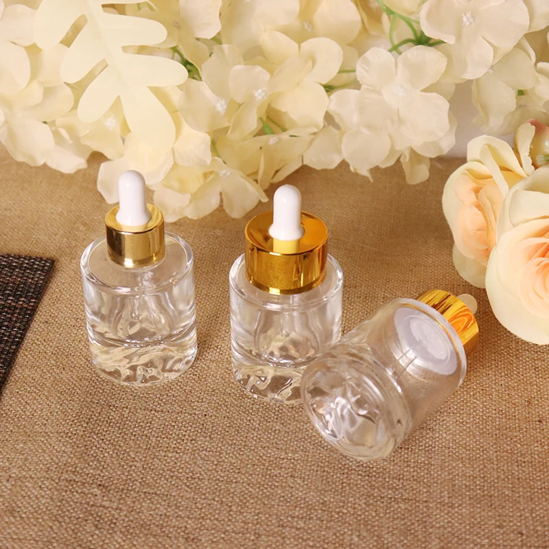 Premium 30ml 40ml Transparent Cylinder Thick Bottom Luxury Crystal Glass Serum Essential Oil Bottle With Gold Wide Dropper Cap