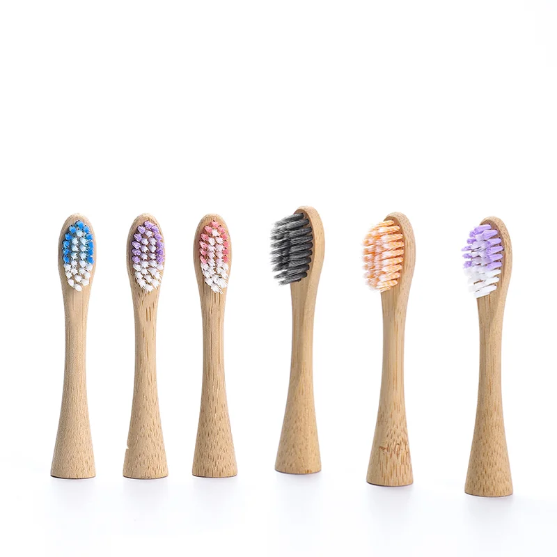 Хит продаж экологически чистая перезаряжаемая ультразвуковая бамбуковая электрическая зубная щетка с головками из древесного угля