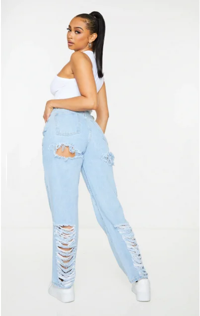 Manufacture custom design light blue wash rips denim pants jeans women