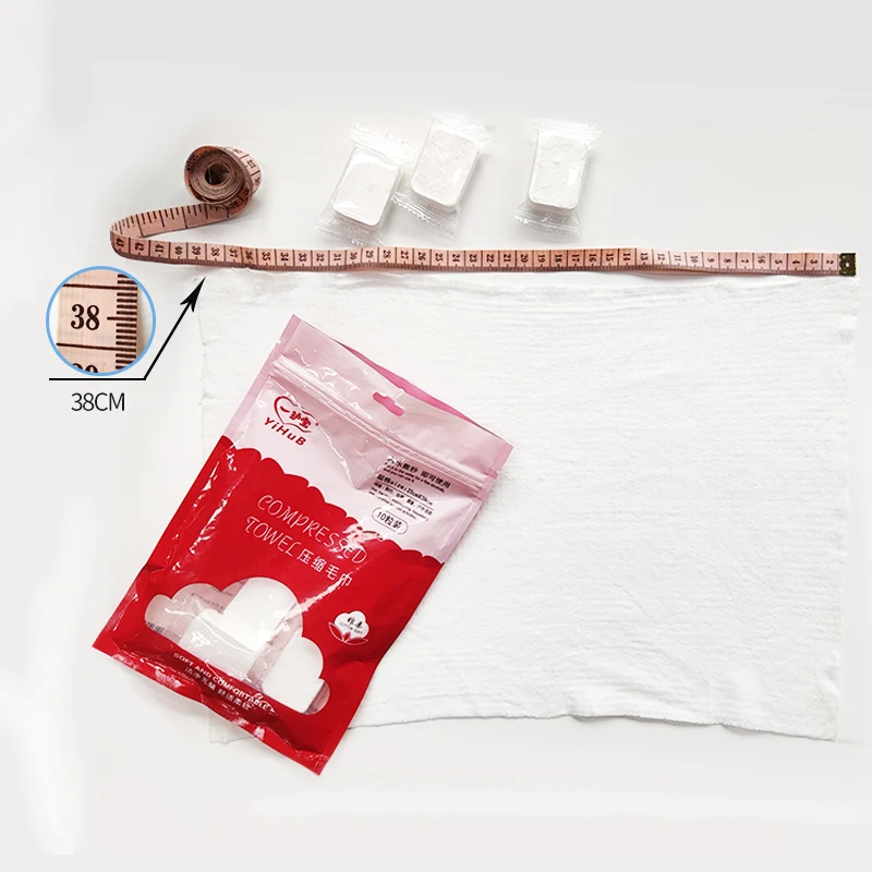 Hot selling 20 pieces 100% portable non-woven compressed towel magic