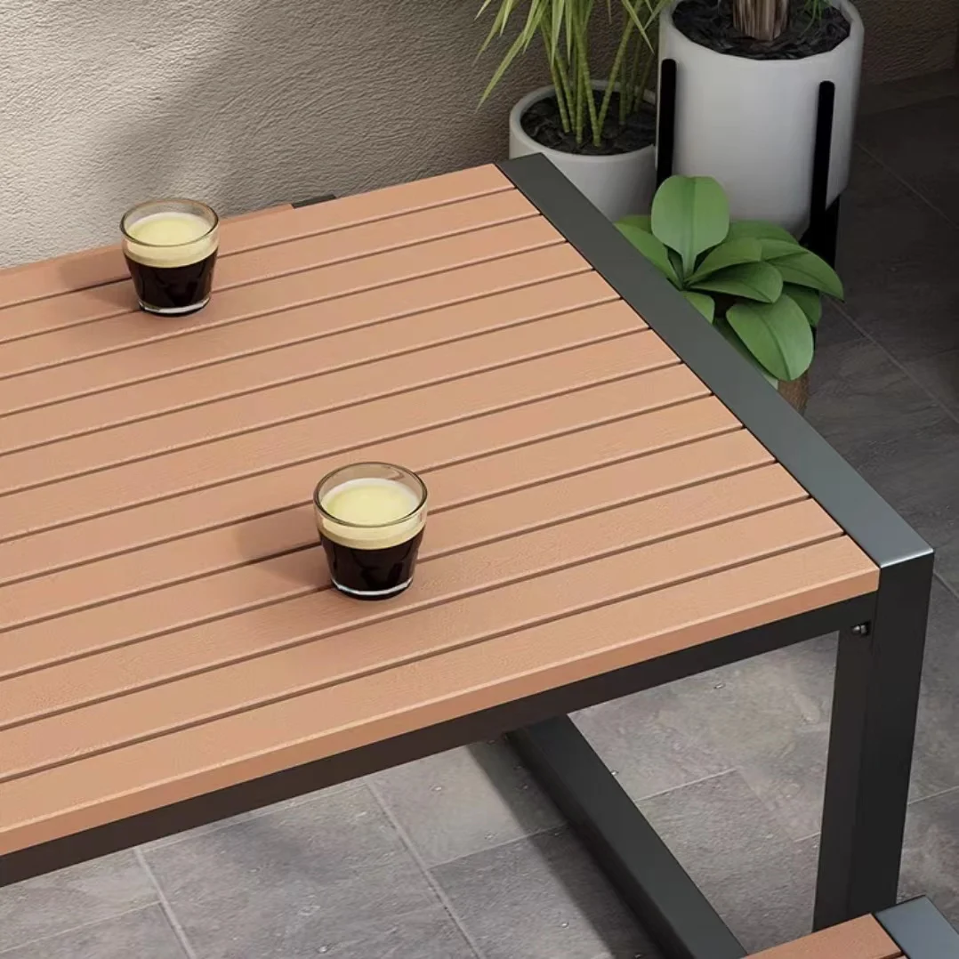 Outdoor Dining Set with Rectangular Metal Frame and Wood Like Tabletop Including 2 Chairs Bench Combining Plastic Wood Elements