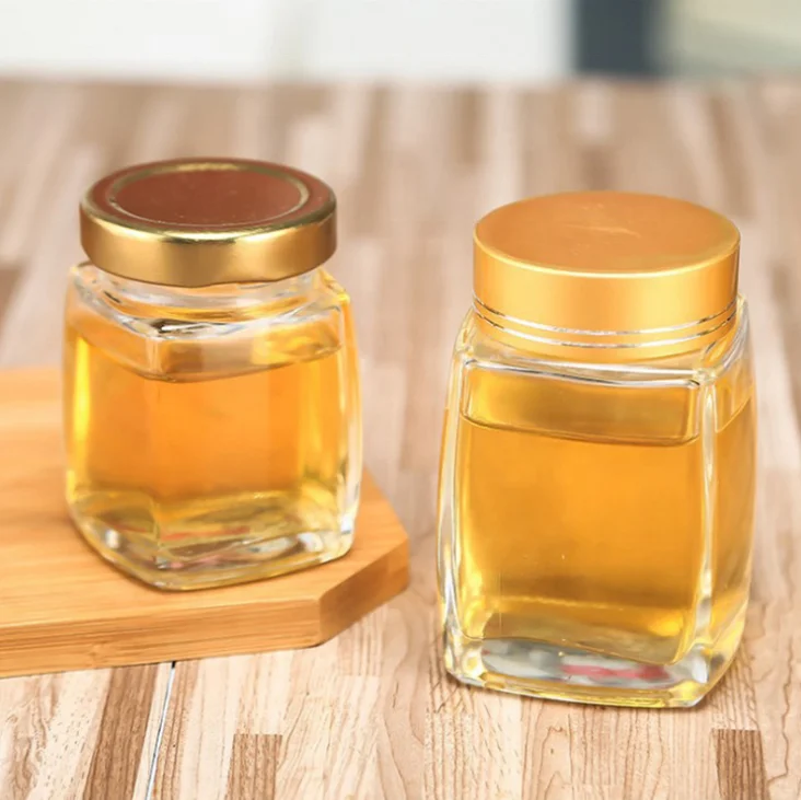 Honey jar with cover can be customized logo honey transparent glass bottle wholesale tomato ketchup manufacturing plant